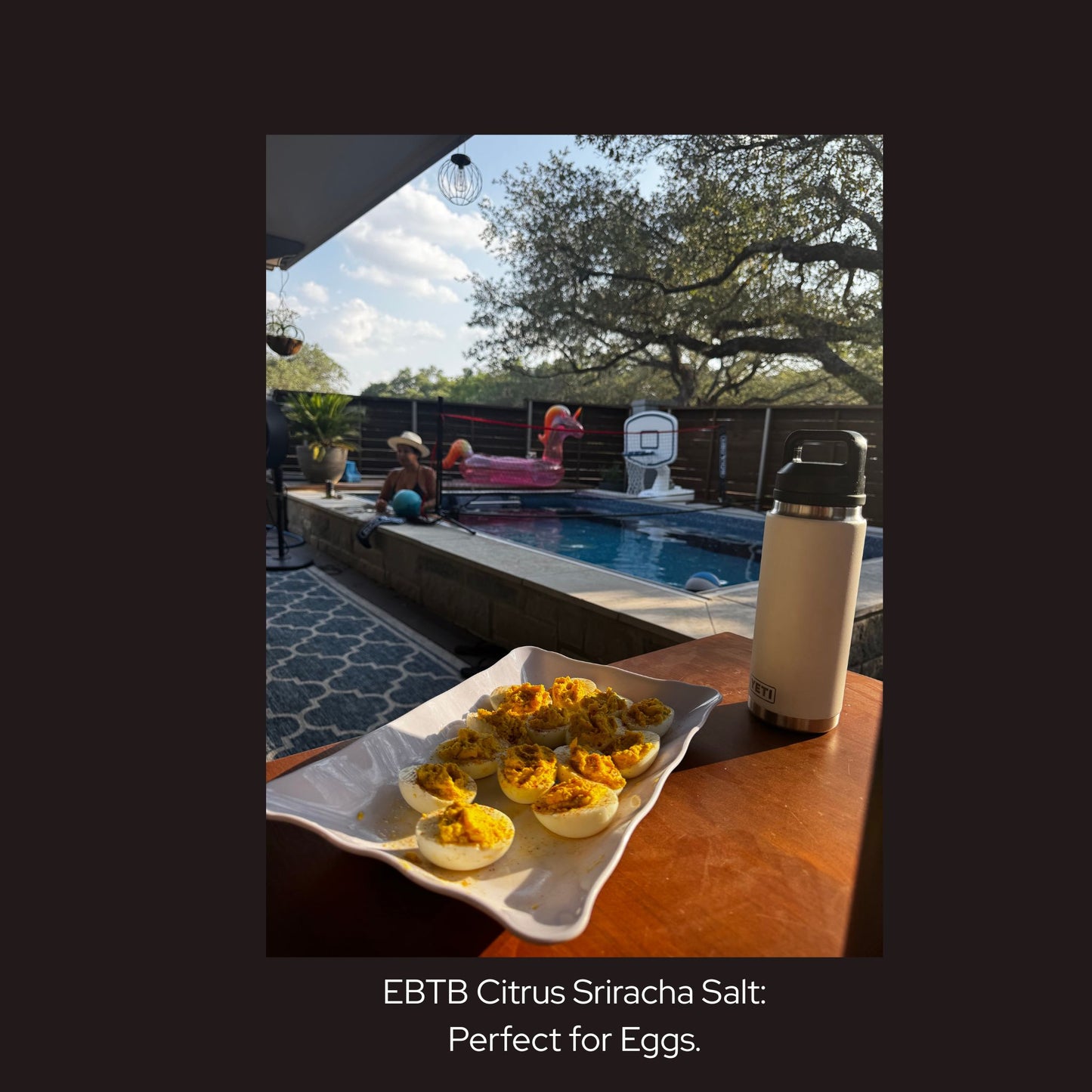 Deviled eggs by the pool topped with Sloan Seasonings – bold, clean flavor for summer snacks and outdoor entertaining