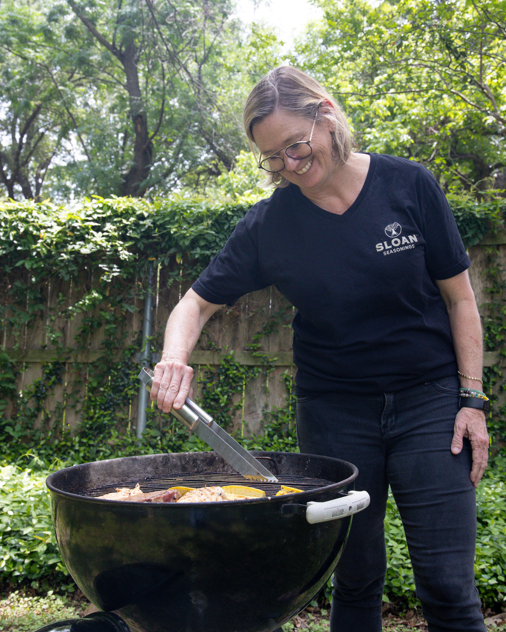Sloan Seasonings founder at BBQ pit 